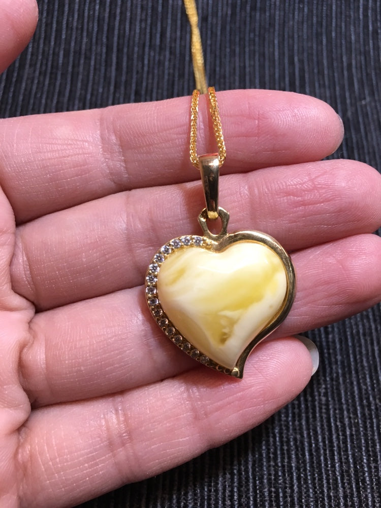Handmade genuine Baltic natural white amber heart pendant, set in 925 sterling silver plated with gold and inlaid with zircon without a chain