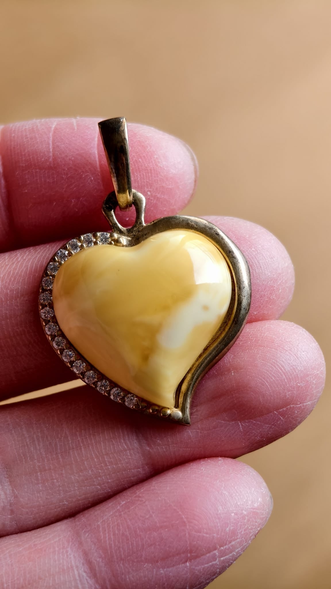 Handmade genuine Baltic natural white amber heart pendant, set in 925 sterling silver plated with gold and inlaid with zircon without a chain
