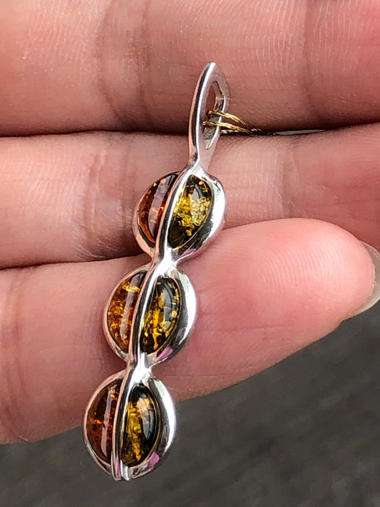 Handmade Baltic natural piebald amber with two-tone 925 sterling silver pendant