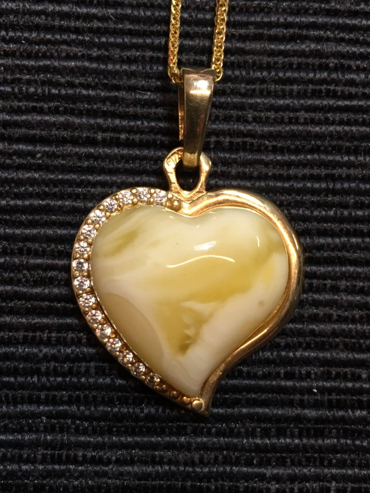Handmade genuine Baltic natural white amber heart pendant, set in 925 sterling silver plated with gold and inlaid with zircon without a chain